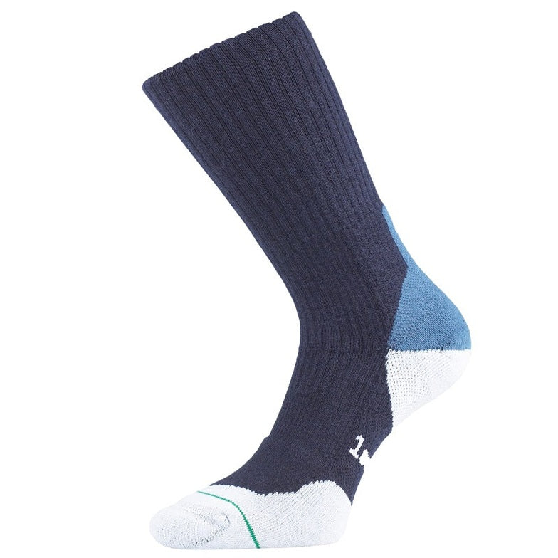 1000 Mile men's outdoor fusion socks for hiking and walking, showing the cushioned fabric and reinforced heel in a natural outdoor setting