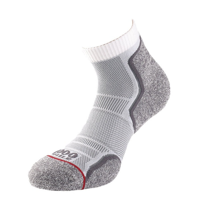 Pair of 1000 Mile men's running anklet socks in a twin pack, featuring breathable fabric and cushioned sole for comfortable running.