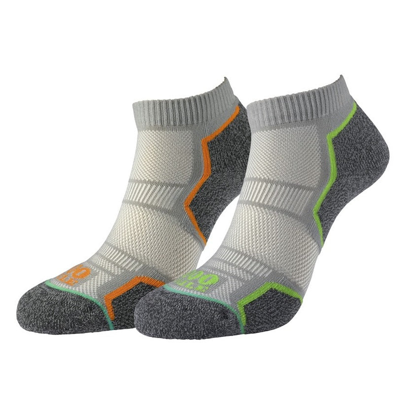 Two pairs of 1000 Mile Men's Run anklet socks in eco-friendly Repreve fabric, designed for comfortable running.
