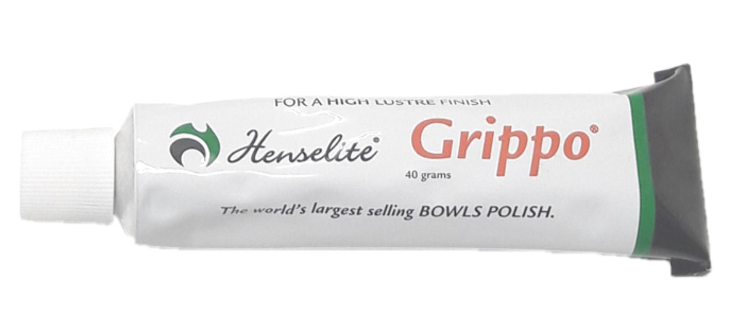 Henselite Grippo Bowls Wax in tube, a lawn bowls grip enhancer, with a small tube and branding visible.