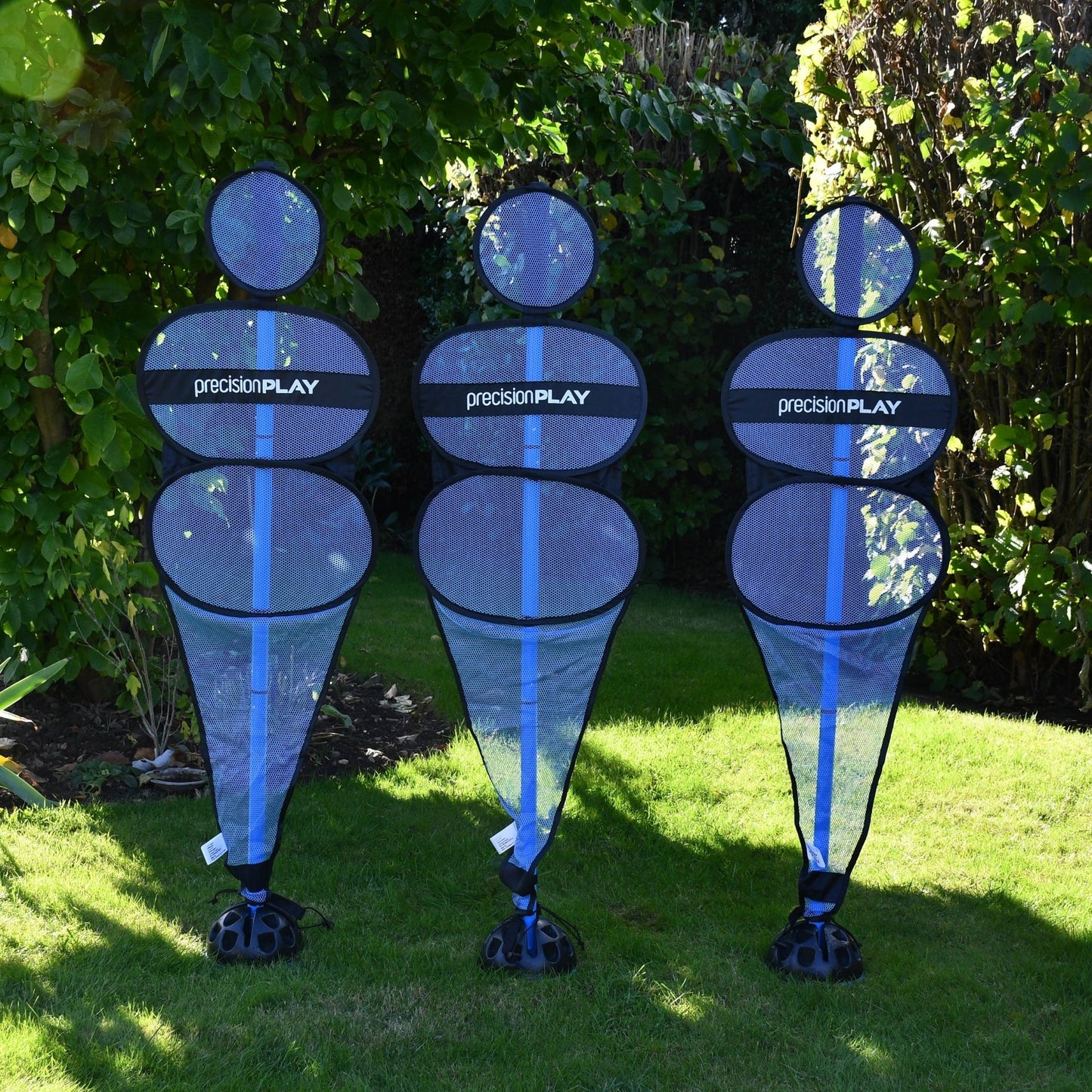 Set of three PrecisionPLAY pop-up football mannequins for sports training and practice drills, portable and easy to set up.