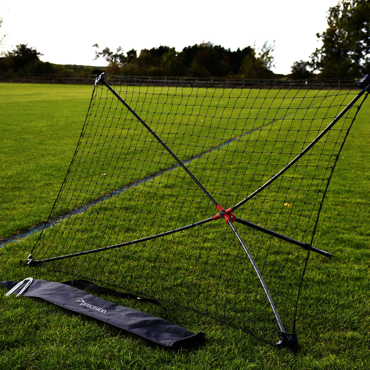 Precision portable rebounder measuring 5' x 3' with a sturdy frame, ideal for sports training and practicing ball rebound drills.