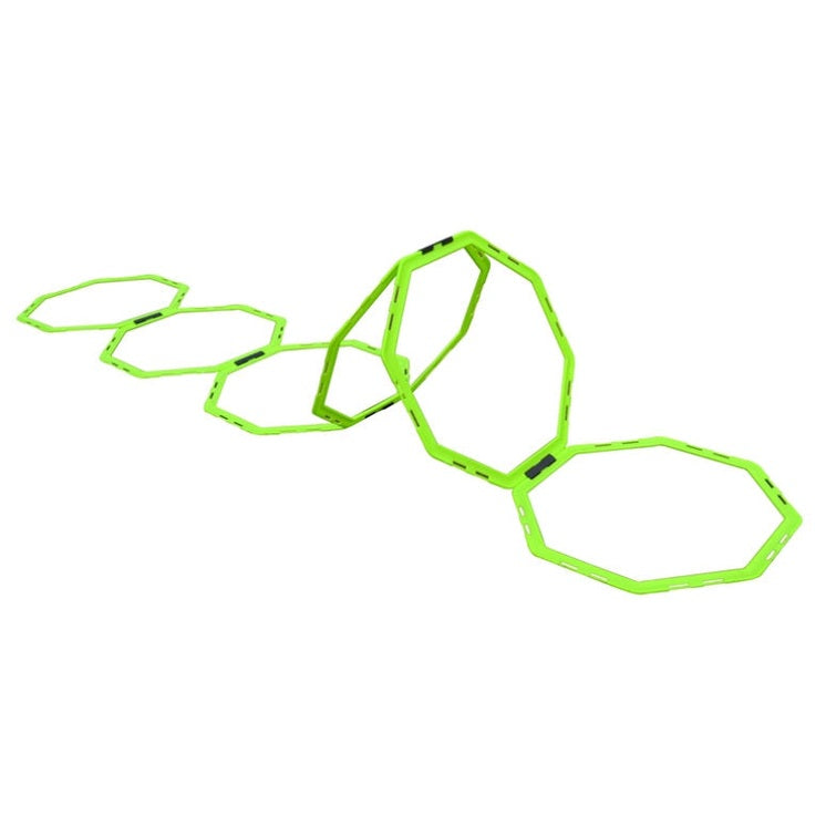 Cartasport Training Octa Ring Set for football drills, featuring 12 durable orange rings on a grassy field.