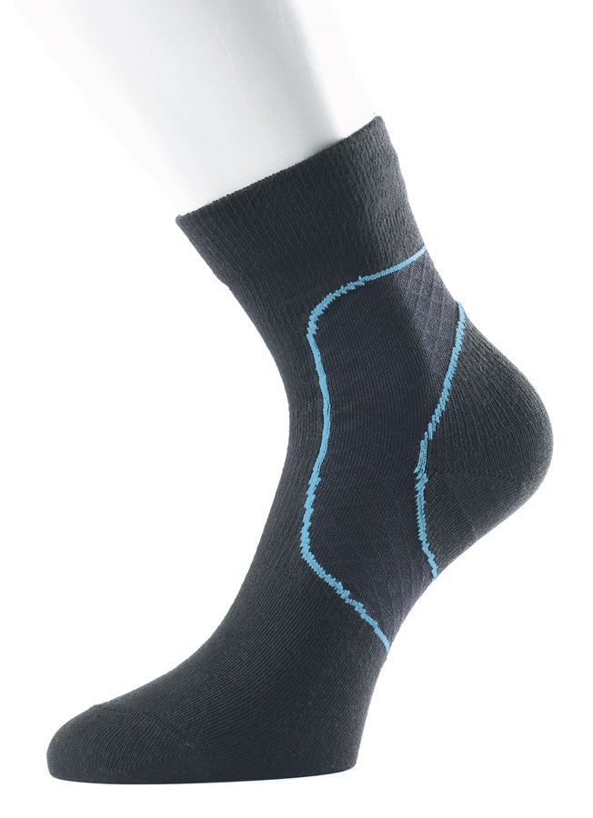 Ultimate Performance compression support sock for running, featuring snug fit and breathable fabric for athletic performance.