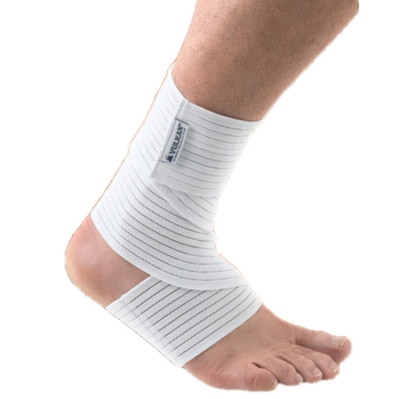 Vulkan White Ankle Wrap medical support brace with adjustable straps, designed for ankle stabilization and compression.