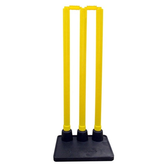 Yellow plastic return wickets with rubber sockets for cricket, designed for durable and reliable gameplay by Cartasport.