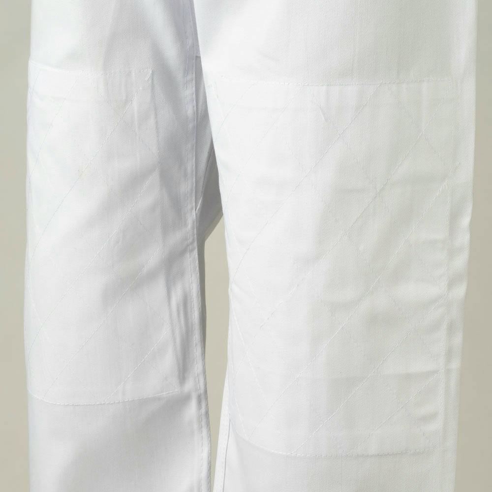 White Blitz adult student Judo Gi made of 350g fabric, featuring a traditional design with reinforced stitching for training and competition.
