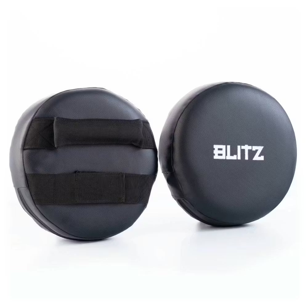 Black Blitz Circular Focus Pads, round Thai training mitts used for boxing and martial arts training.