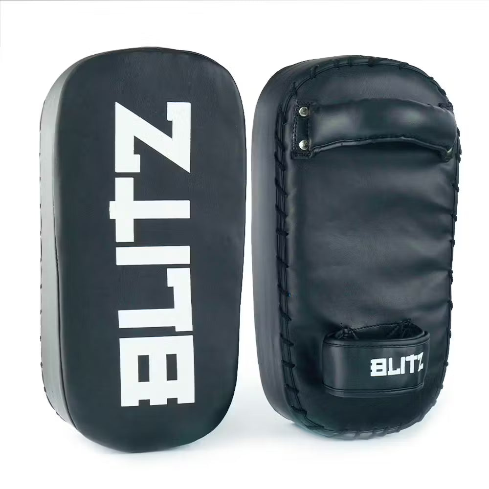 Pair of Blitz Thai Pads for Muay Thai training, showing padded surface and handles, designed for martial arts practice and striking drills.