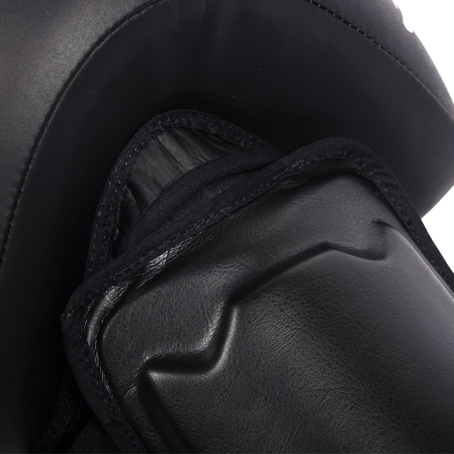 Fairtex SP10 Calf Kick Protection in black, designed for sporting goods, showing padded calf guard for martial arts training.