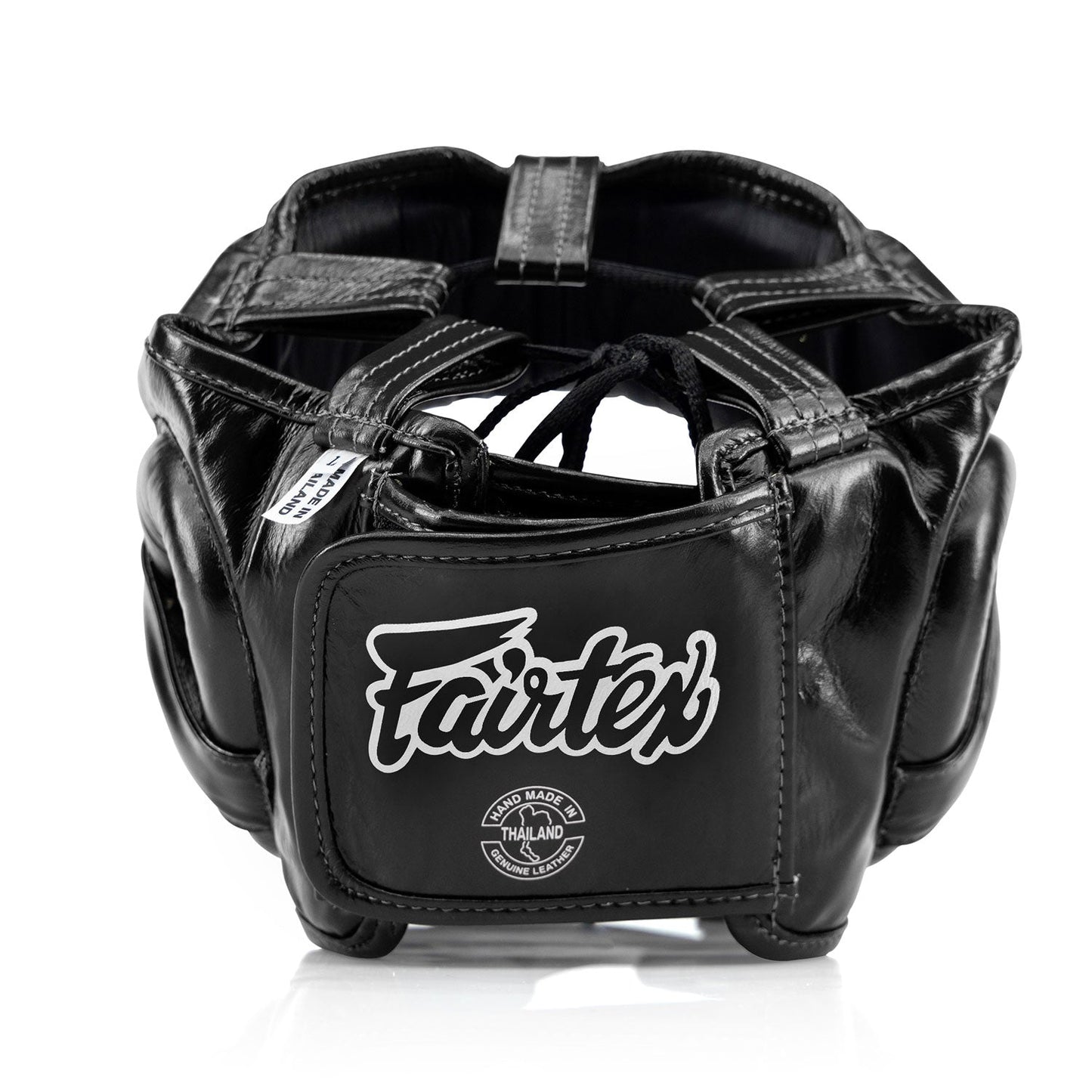 Fairtex Mexican sparring headguard in black with adjustable straps, designed for boxing and martial arts training.