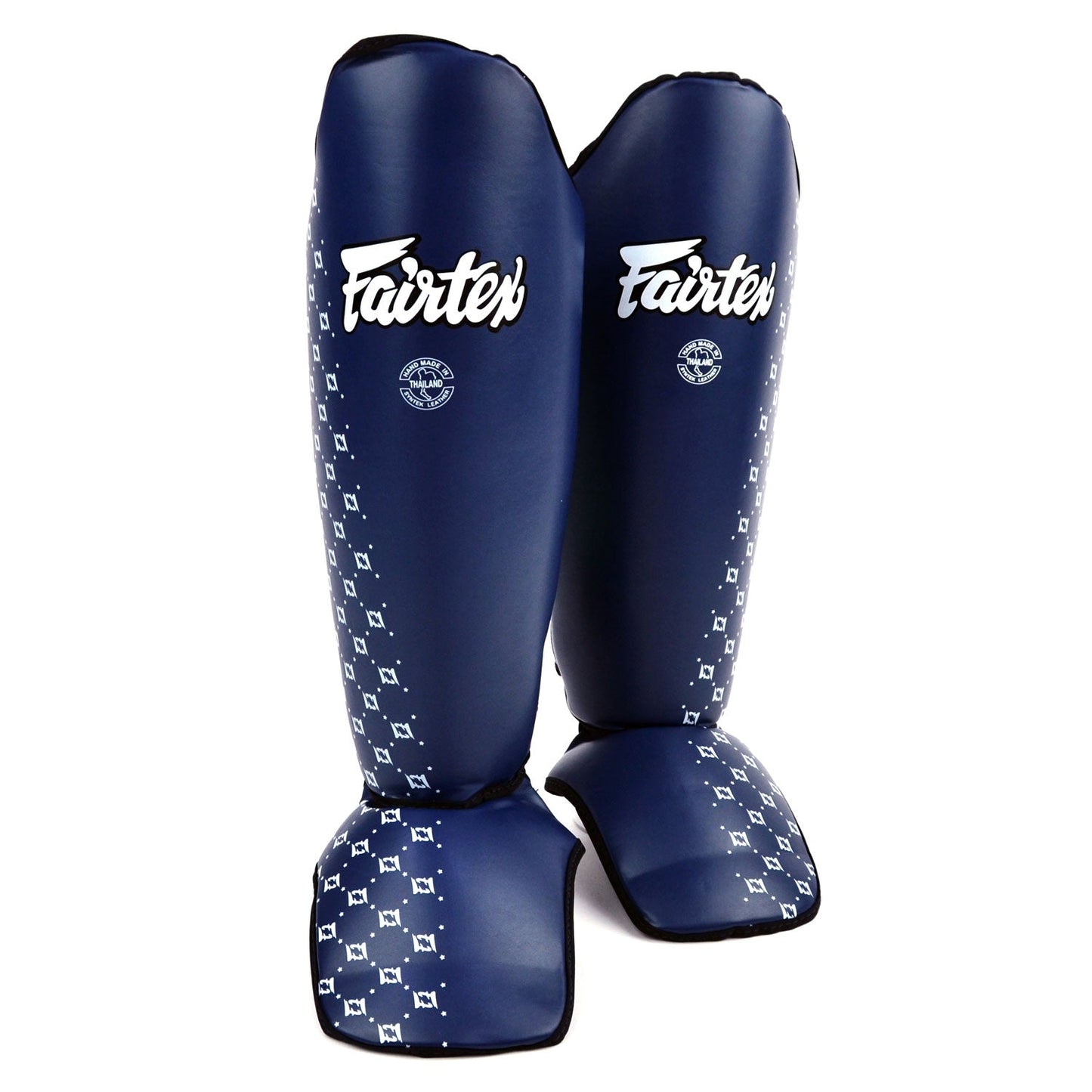 Fairtex blue shin pads for martial arts and boxing, padded protective gear for training and competition.