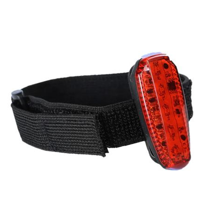 Bodylite Gear Clip-On LED Light for sporting goods, showing a compact, adjustable LED light clipped onto sports gear.