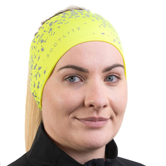 Bodylite Gear reflective beanie showing a snug fit with reflective accents, ideal for outdoor sporting activities in low light conditions.