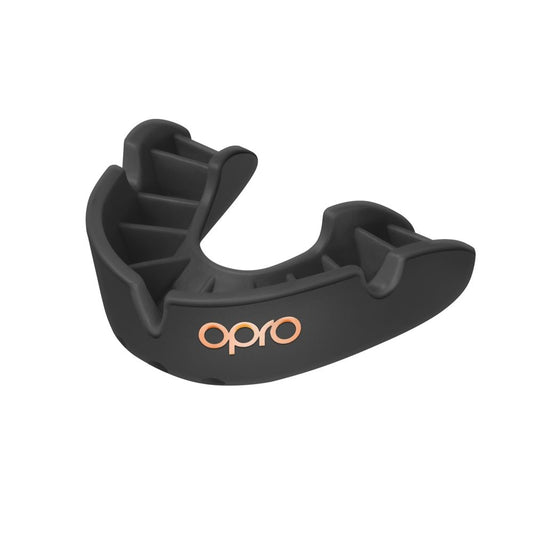 Opro Bronze Self-Fit Mouthguard for sports, showing the molded, snug-fitting protective mouthguard in blue color.
