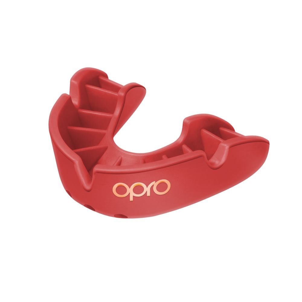 Close-up of OPRO Bronze Self-Fit Mouthguard in blue, designed for sports protection, showing its flexible, molded fit.