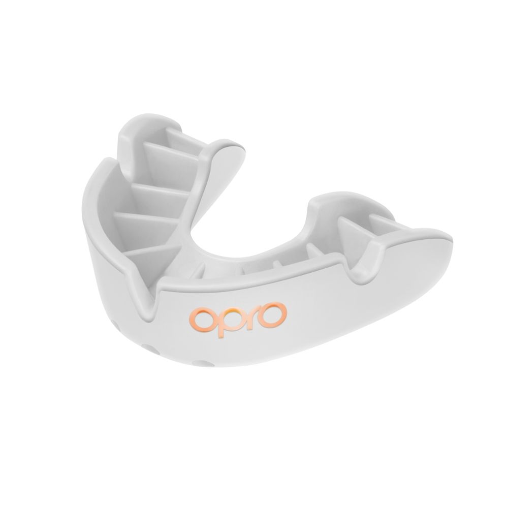 OPRO Bronze Self-Fit Mouthguard for sporting goods, showing the molded protective dental guard in its packaging.