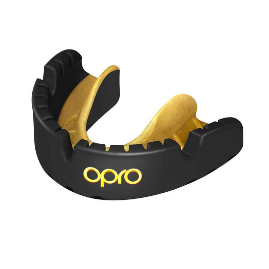 OPRO Gold Braces Self-Fit Mouthguard for sports, shown in a clear image, designed to protect teeth during athletic activities.