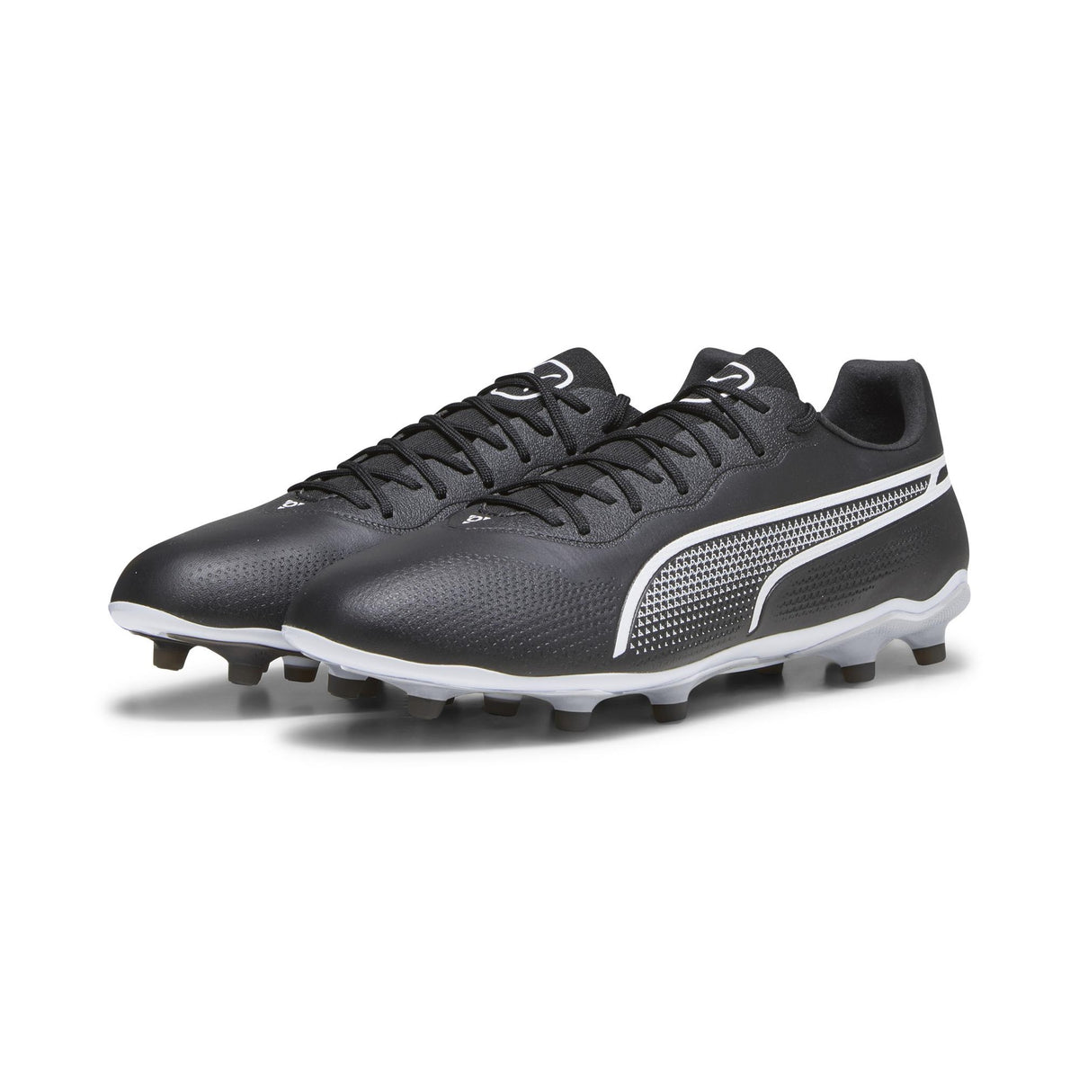 Puma King Pro FG football boots with sleek design, synthetic upper, and firm ground studs for soccer performance.