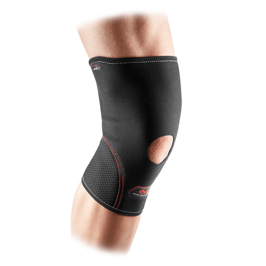 McDavid neoprene knee sleeve with open patella, black, supportive sports gear for knee compression and stability.
