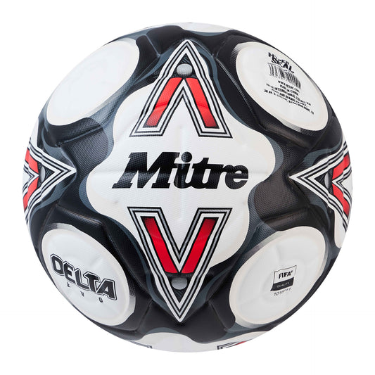 Mitre Delta Evo football resting on a field, showcasing its textured surface and branding for sporting goods use.