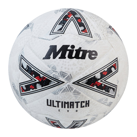 Mitre Ultimatch Evo football resting on a grassy field, showcasing its durable synthetic leather surface and professional design.