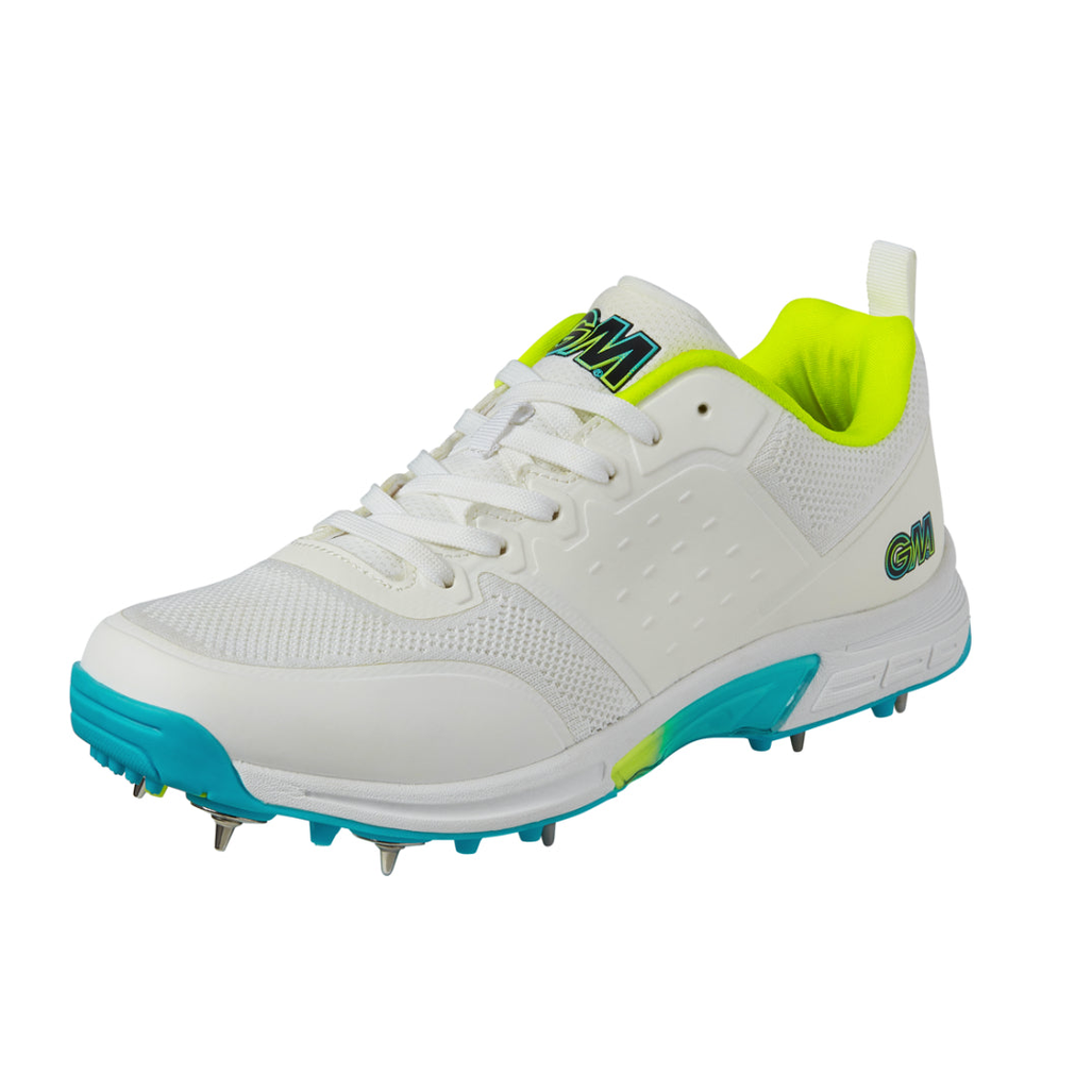 Gunn and Moore GM Aion Spike cricket shoes with black and white design, featuring spikes and athletic sole for sports performance