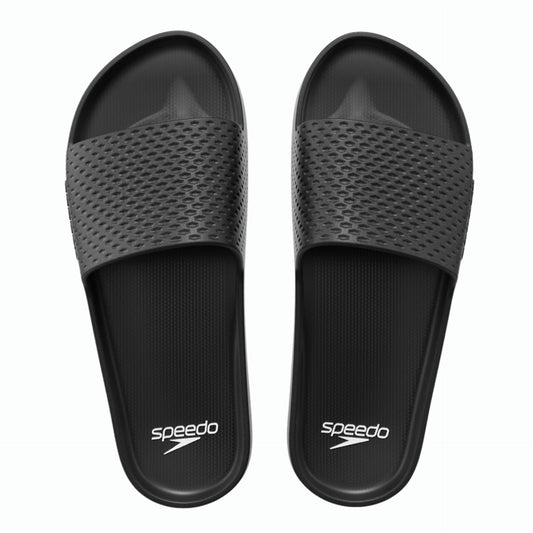 Speedo Essential Slides in black and white with cushioned straps and textured soles, perfect for sporty casual wear.