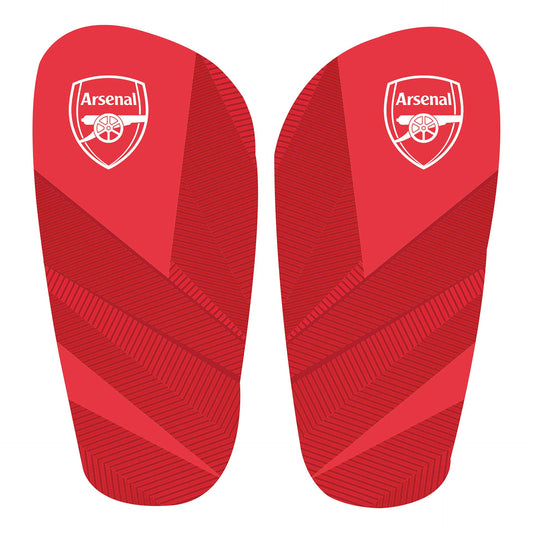 Team Merchandise slip-in shin guards for sports, showing padded protective gear with adjustable straps and logo branding.