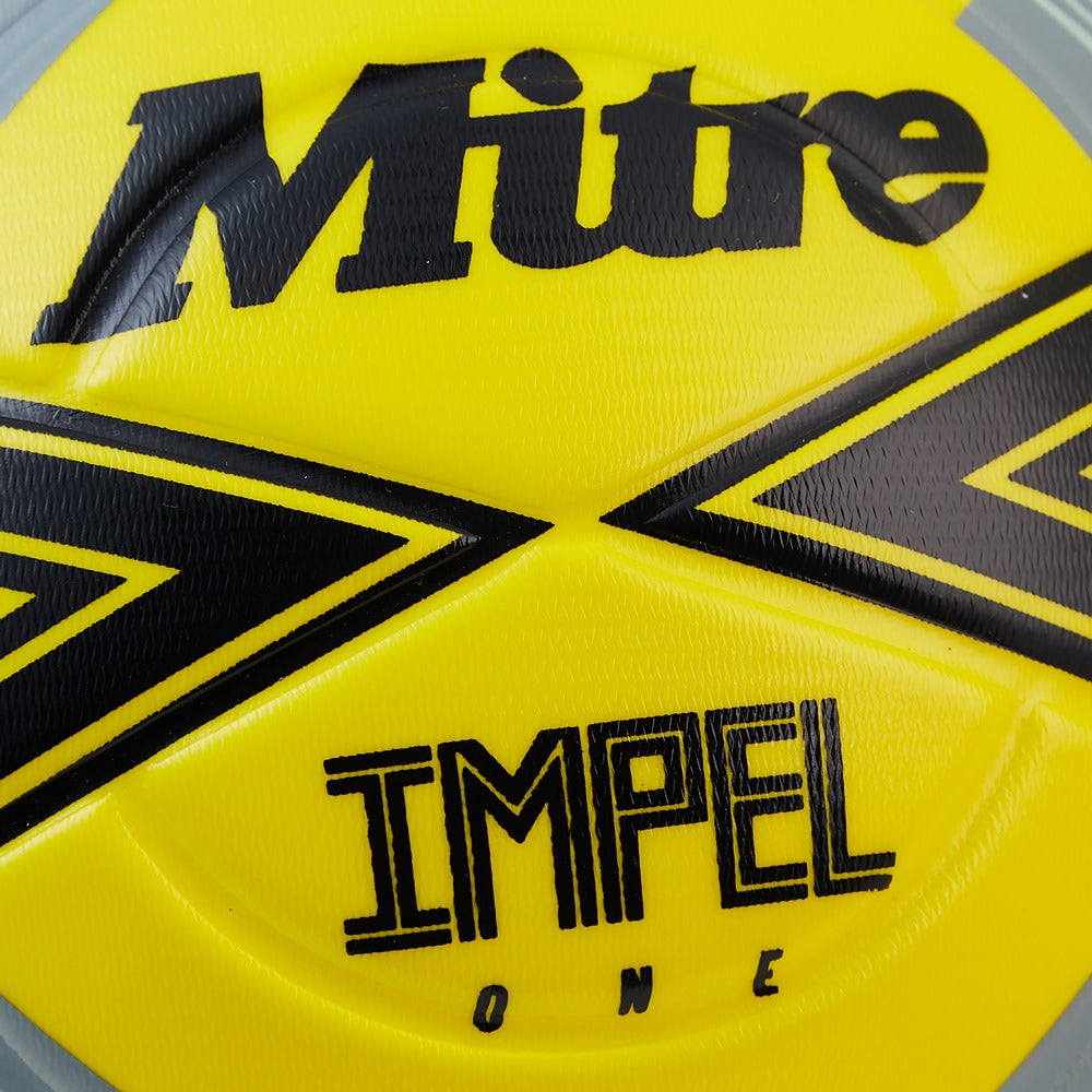 Mitre Impel One football ball with white and blue panel design, close-up view showing textured surface and brand logo.