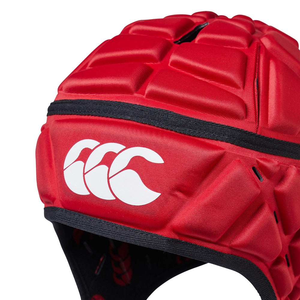 Canterbury Raze rugby headguard showing padded helmet with chin strap, designed for protection during rugby matches.