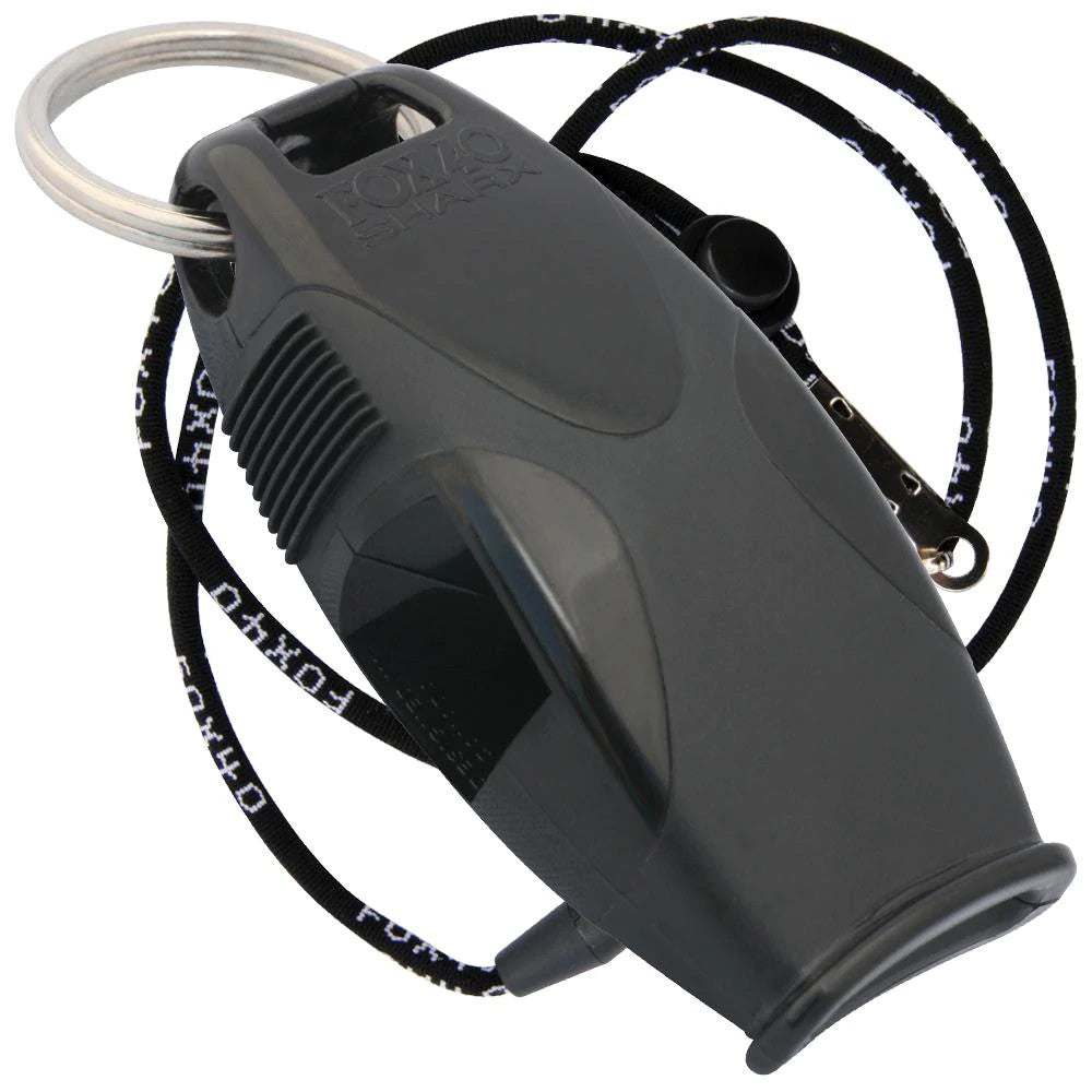 Fox 40 Sharx whistle with lanyard, compact safety whistle designed for sports, outdoor activities, and emergency signaling.