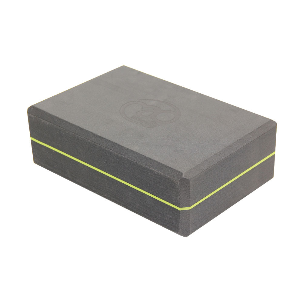Fitness-Mad Yoga Mad 369 yoga block in foam, showing its rectangular shape and textured surface for support during yoga practice.