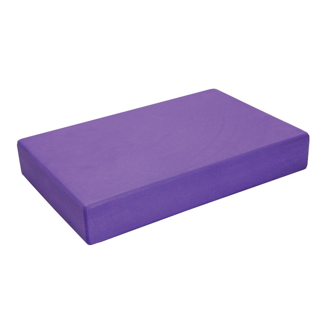 Fitness Mad full yoga block made of durable foam, used for support and stability during yoga and stretching exercises.