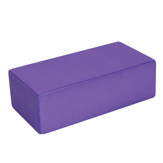 Yoga Mad Hi-Density EVA Foam Yoga Brick used for stretching and support in yoga and fitness routines.