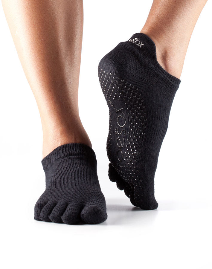 Fitness-Mad Toesox low rise full toe socks for sports, showing black fabric with individual toe compartments and comfortable fit.
