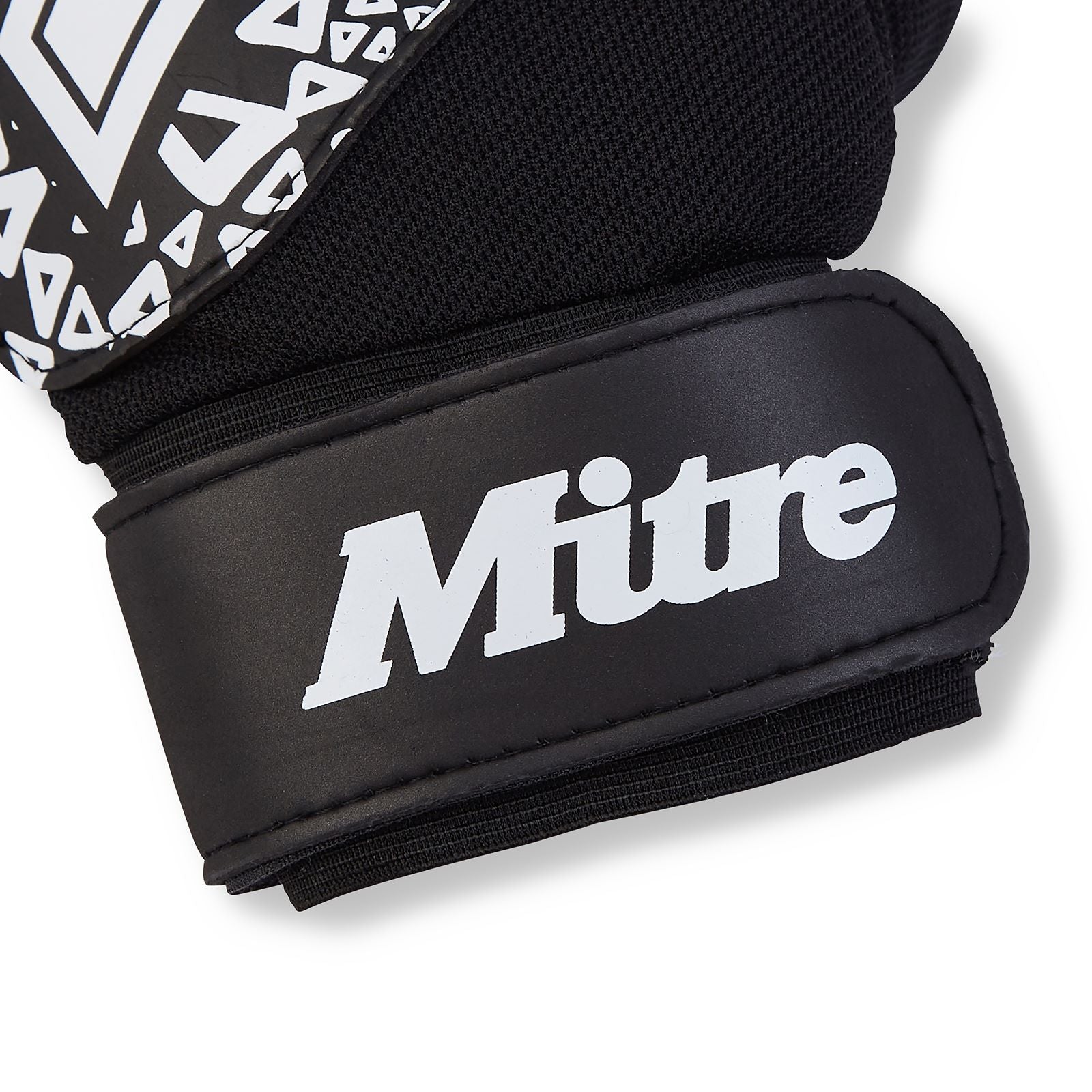 Mitre Senior Magnetite Goalkeeping Glove for football, showing padded palm and wrist strap, designed for goalkeeper protection.
