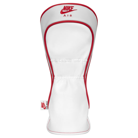 Nike Icon Driver headcover in pink, white, and red with Nike logo, designed for golf clubs, showing vibrant colors and textured fabric.