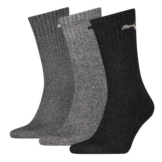 Set of three Puma sports crew socks in black, white, and gray with cushioned soles and ribbed cuffs for athletic comfort.