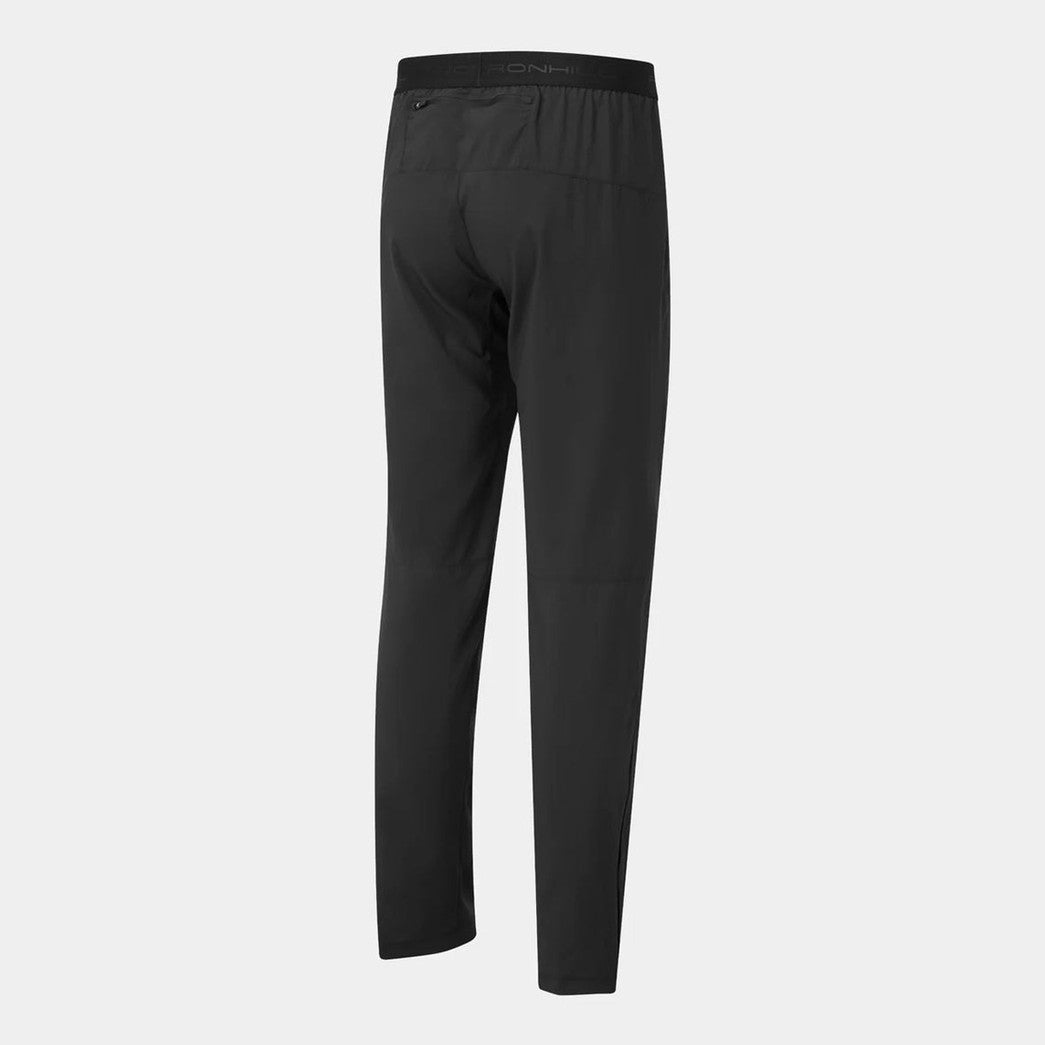 Ronhill men's Core Session Trackster, lightweight black running track pants with adjustable waistband and reflective details.