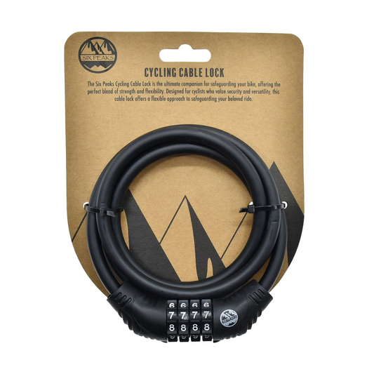 Six Peaks cycling cable lock with coiled steel cable and combination lock for bike security, shown in a close-up view.