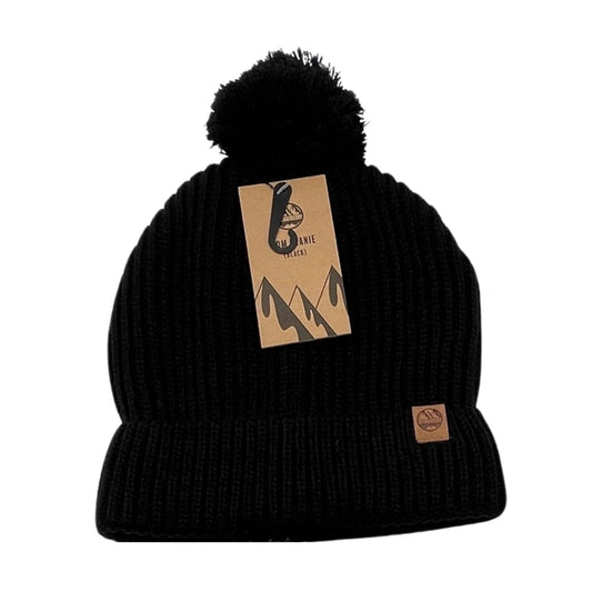 Six Peaks Pom Beanie in sporting goods, featuring a cozy knit design with a pom on top, ideal for cold weather.