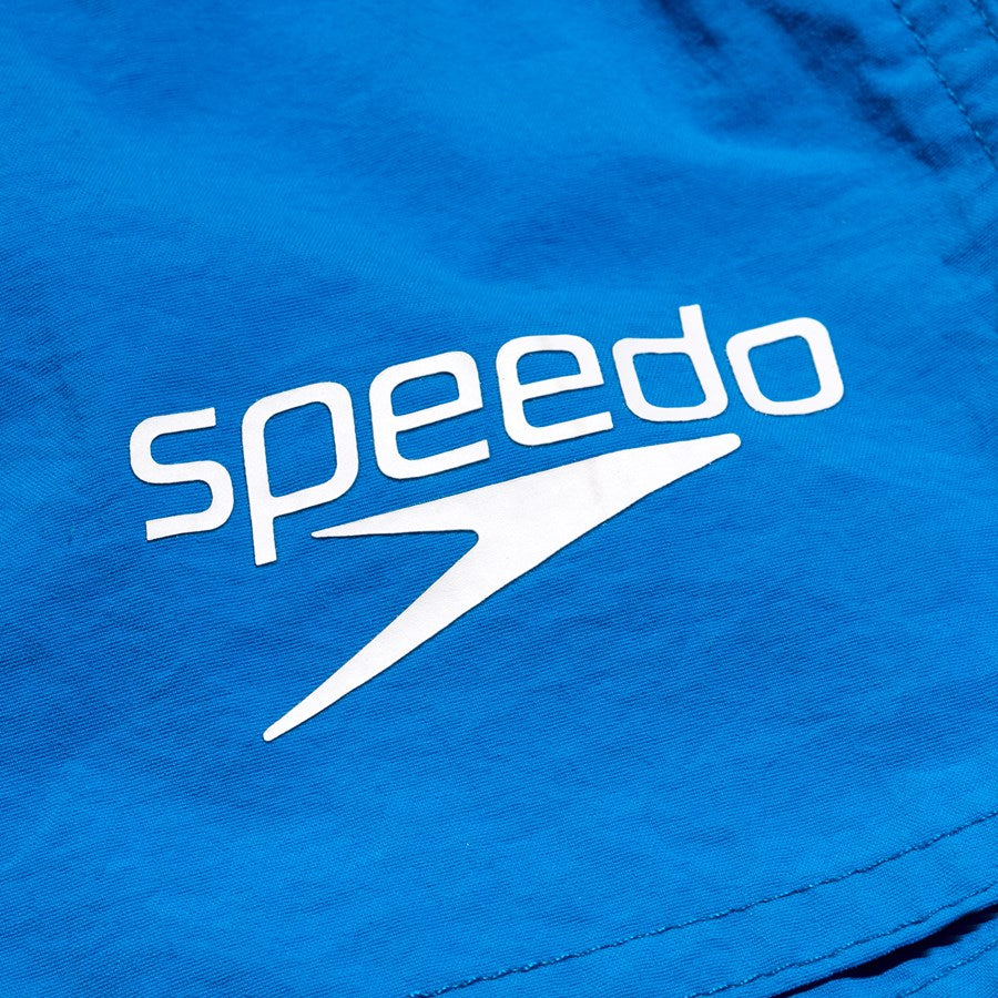 Speedo Junior Essential Water Shorts, 13-inch swimming trunks in navy with Speedo logo and elastic waistband.