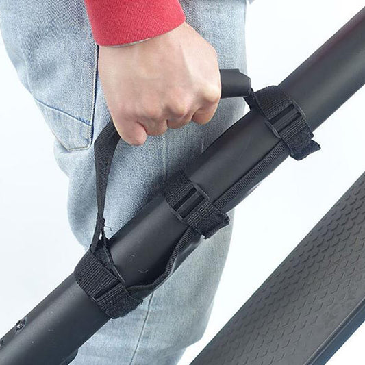 SURG Electric Scooter Carry Strap showing adjustable strap with padded handle for easy transport of electric scooters.