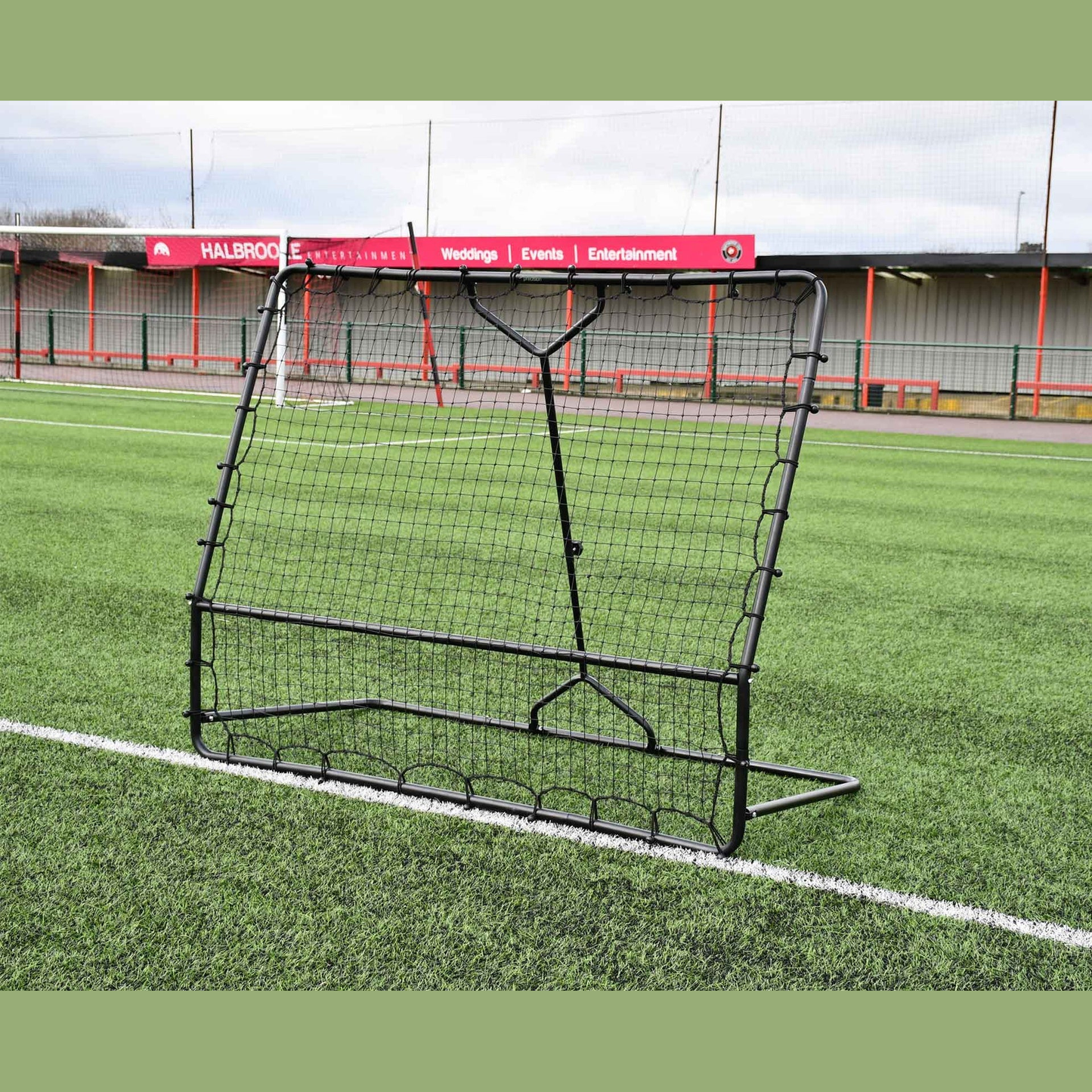 Precision Pro Two Angled Rebounder for sports training, featuring sturdy frame and two angled surfaces for versatile rebound practice.