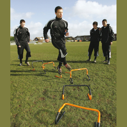 Set of six adjustable Precision training hurdles with 6-12 inch height, shown with storage bag for sporting goods and agility training.
