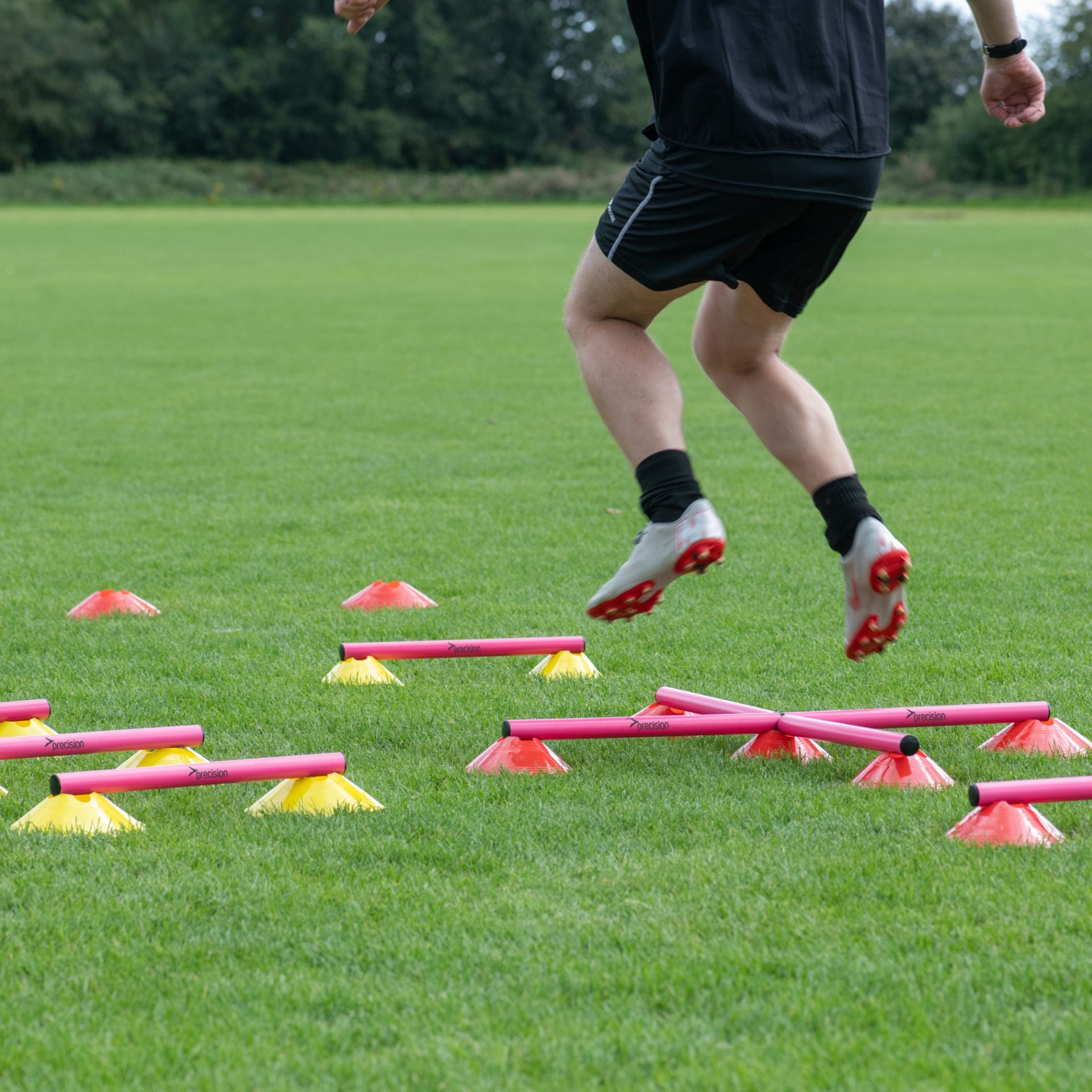 Precision Speed Agility Ladder with Cones set for sports training, featuring colorful agility ladder and cones on a gym floor.