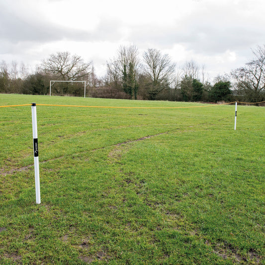 Precision crowd barrier kit with six poles, 60m rope, and ground anchors for crowd control and event management.