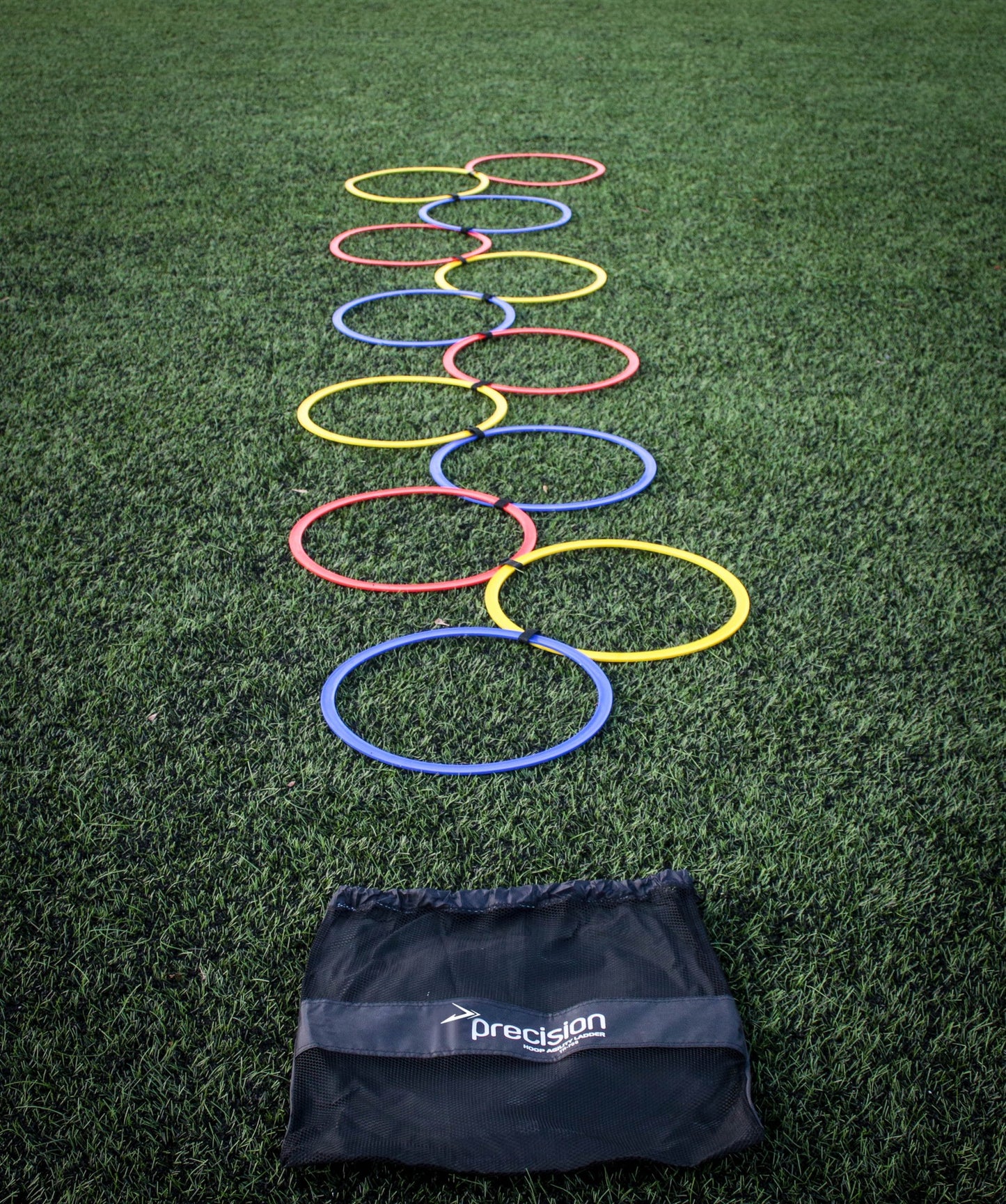 Precision Speed Agility Hoop Ladder for sports training, featuring colorful plastic rungs and sturdy side rails for agility drills.