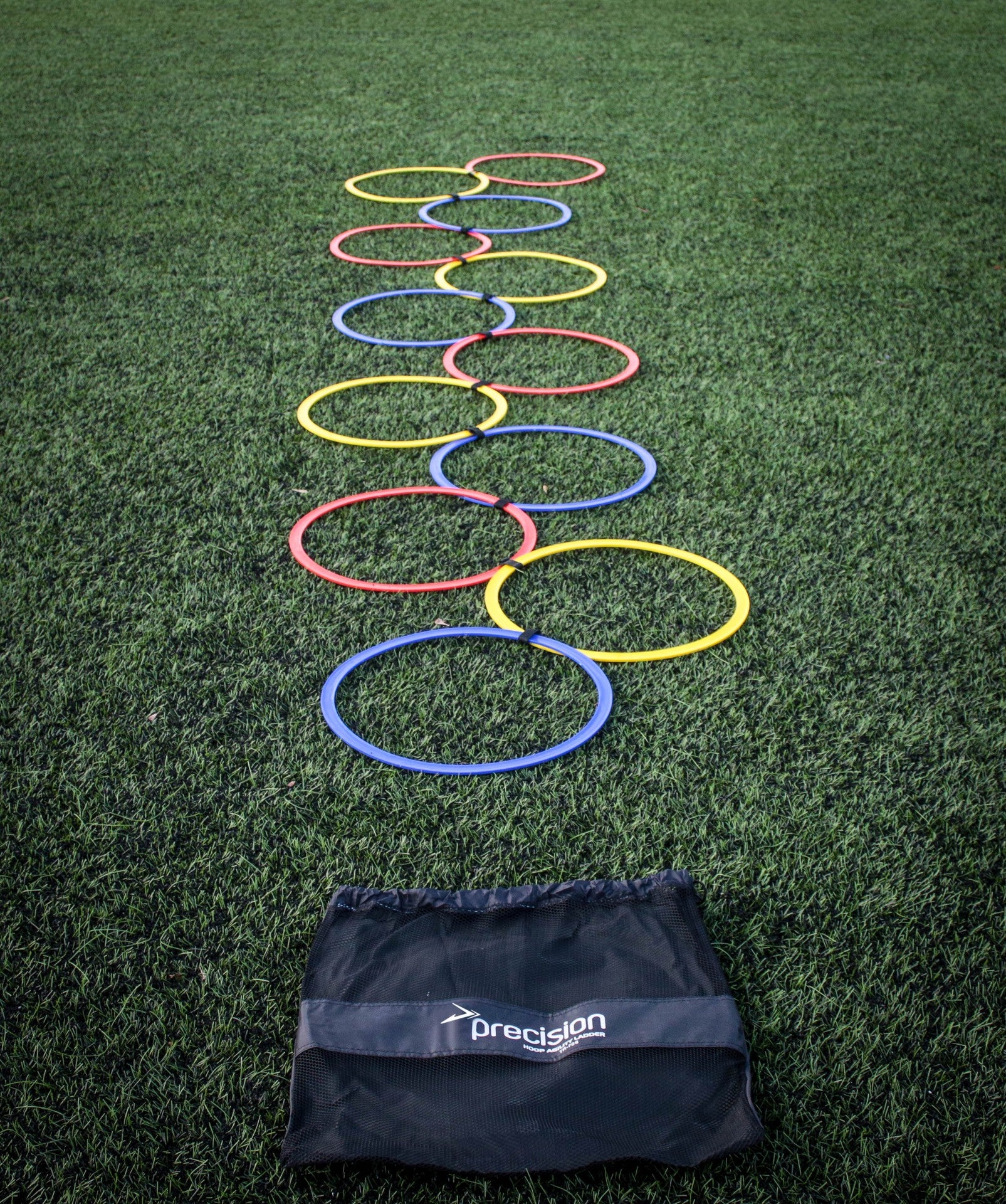 Precision Speed Agility Hoop Ladder for sports training, featuring colorful plastic rungs and sturdy side rails for agility drills.